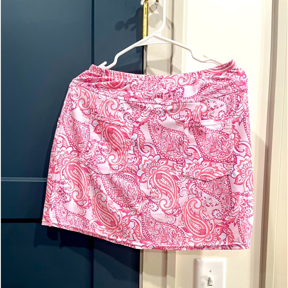 Pink and white skort, pockets in the front and back,only worn a couple of times.